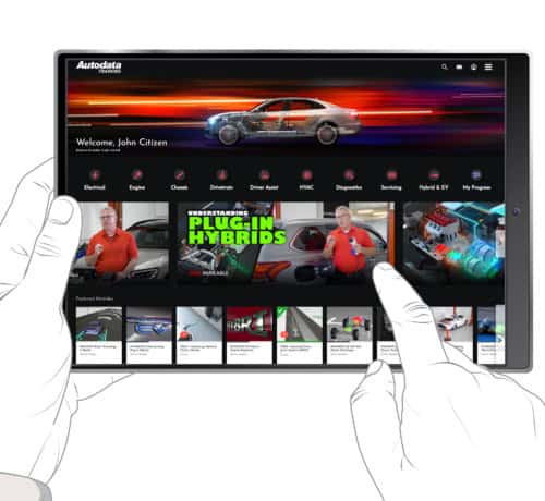 User interacting with Autodata Group NZ digital repair data platform on tablet.